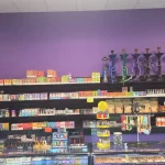 A bustling smoke shop environment displaying an assortment of items, from bongs to cigars and tobacco, arranged for easy browsing.