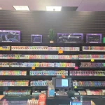 A bustling smoke shop environment displaying an assortment of items, from bongs to cigars and tobacco, arranged for easy browsing.